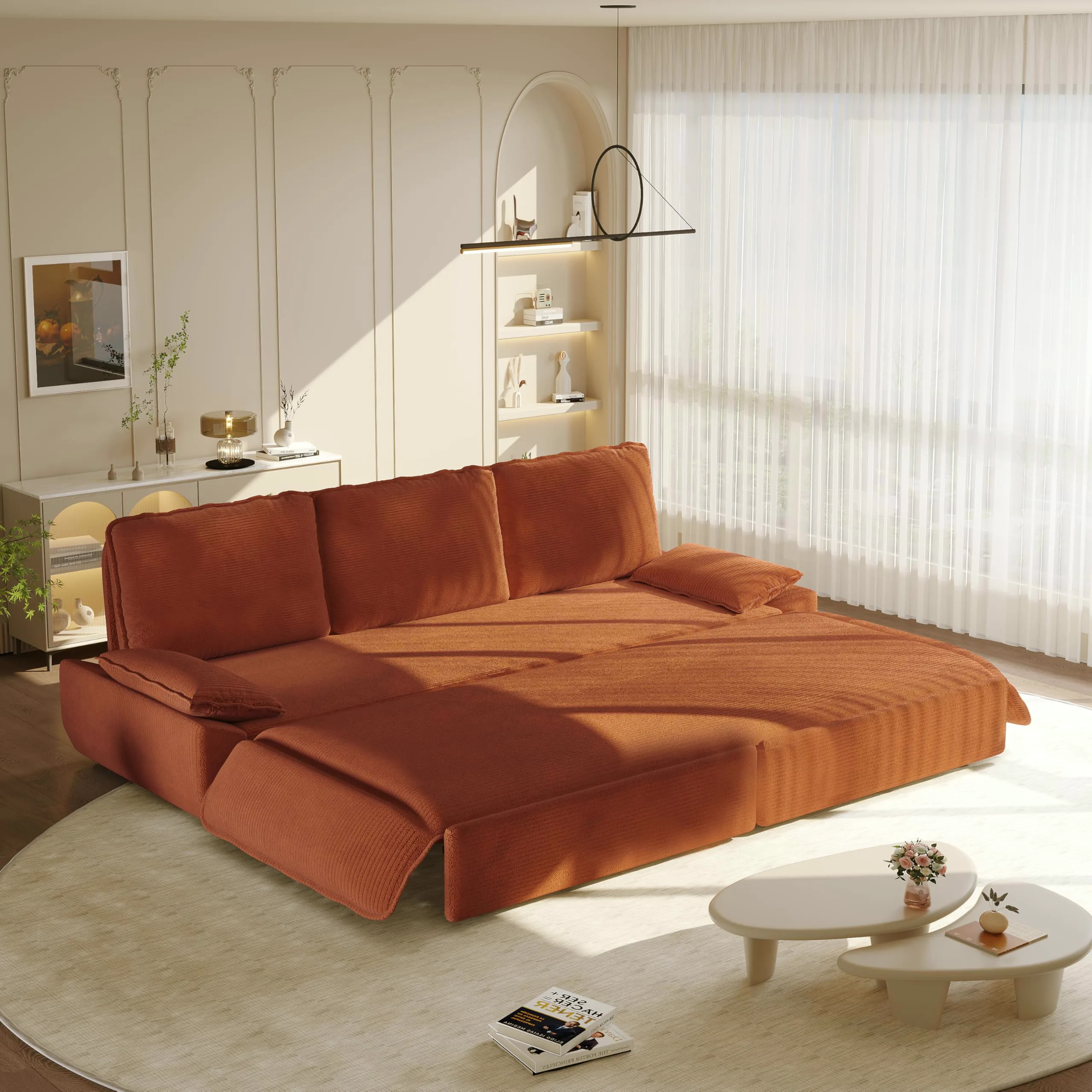 Orange corduroy sleeper sofa opened out into a bed in a bright room
